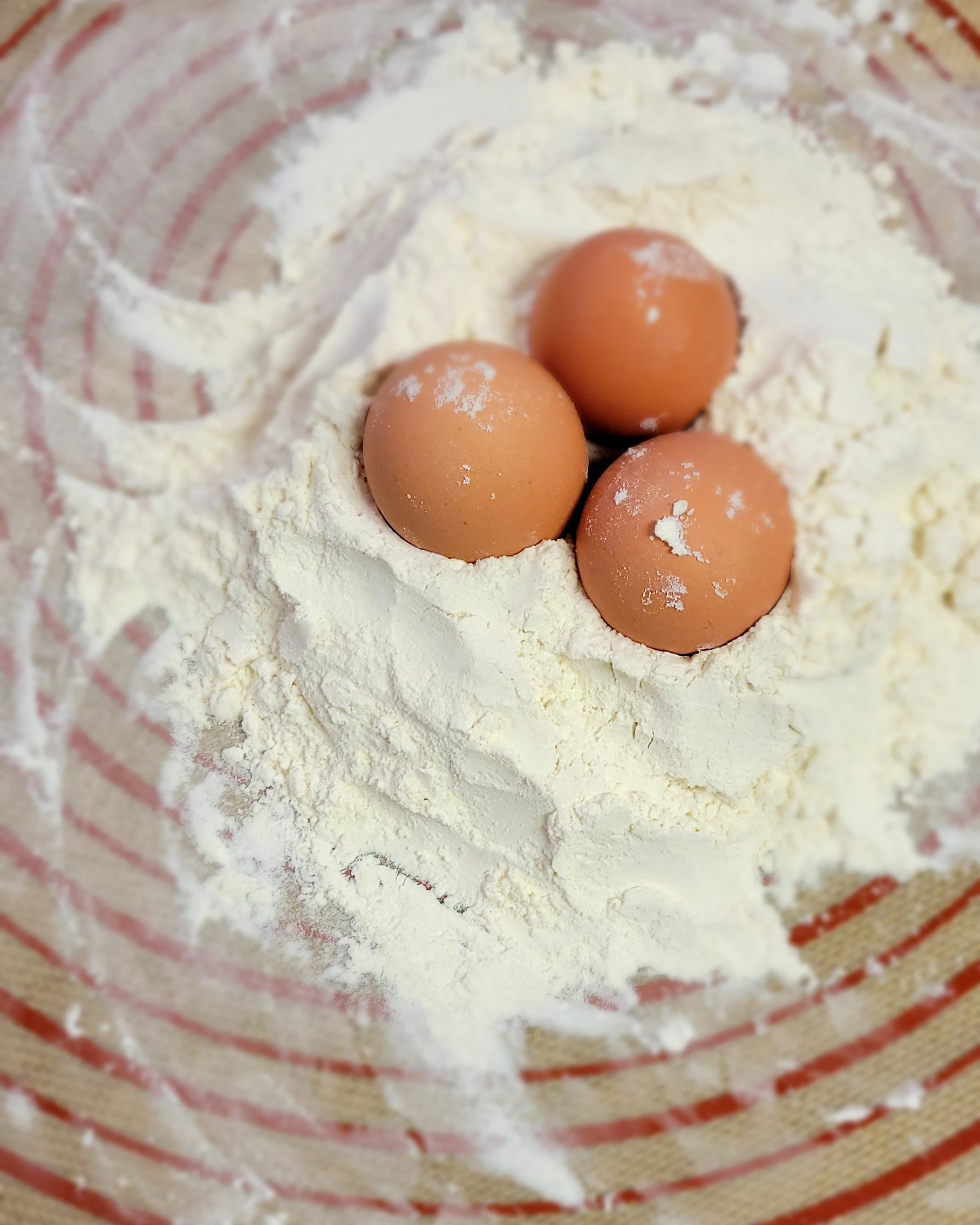 a picture of three whole eggs